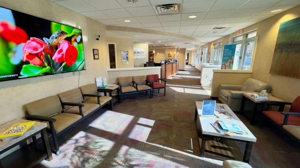Comfortable patient waiting area and reception lobby inside Boyd Orthodontics office in Glen Allen, VA 23059