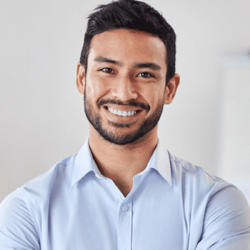 Adult patient smiling during Invisalign clear aligner treatment at Boyd Orthodontics in Glen Allen, VA 23059